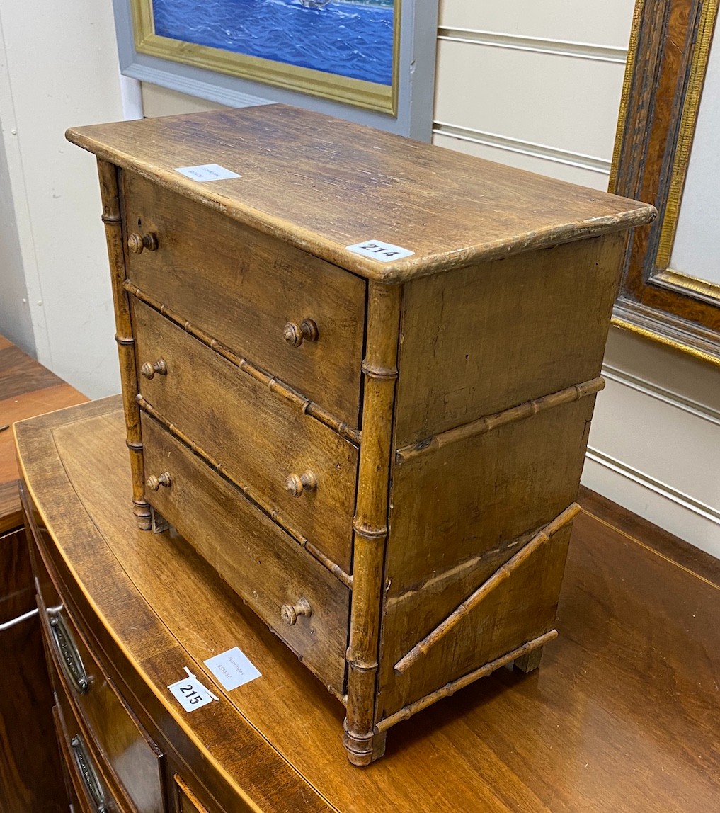 A Victorian miniature faux bamboo chest of three drawers, width 42cm, depth 21cm, height 39cm